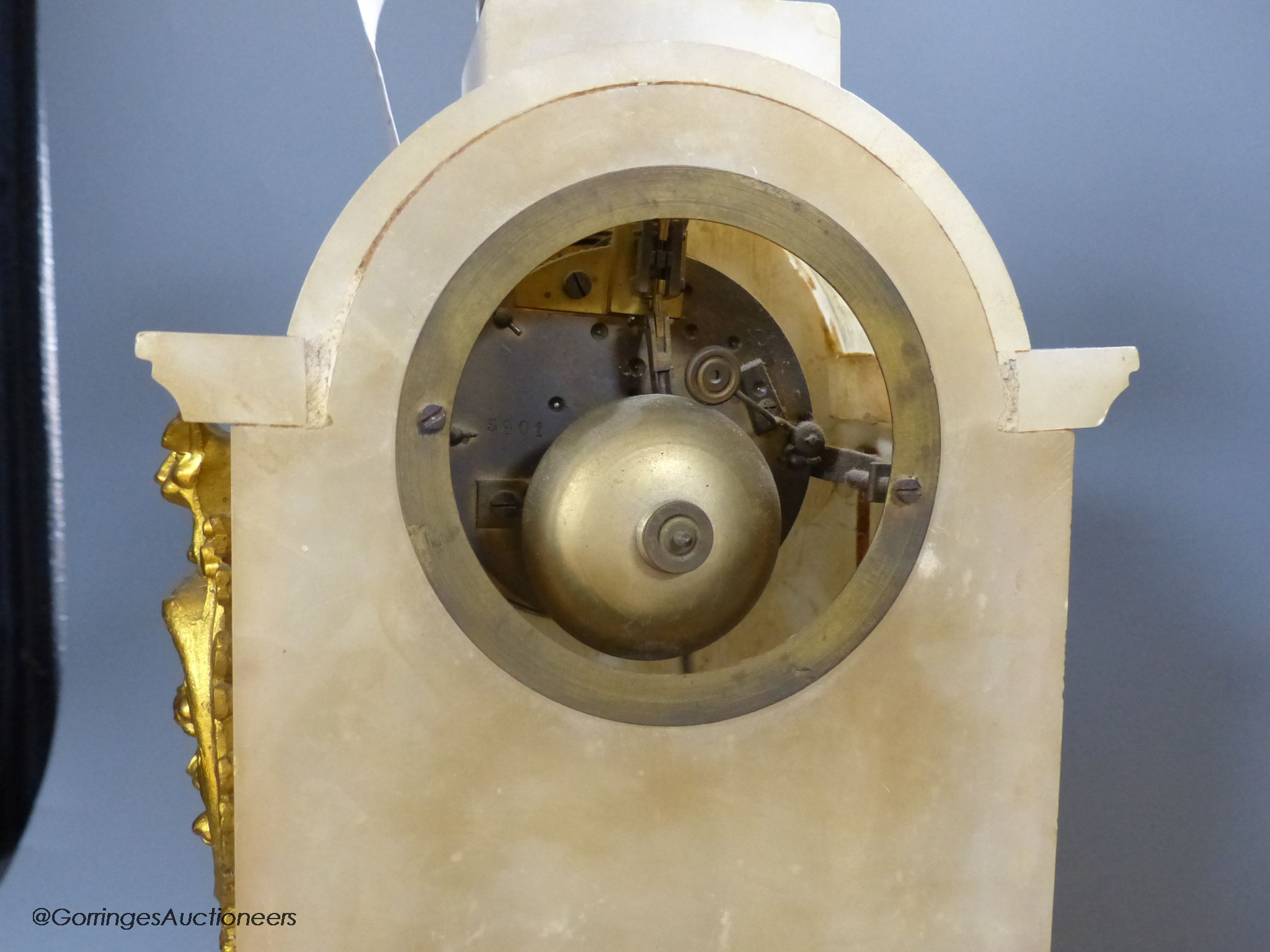 A 19th century French onyx mantel clock, overall height 49cm